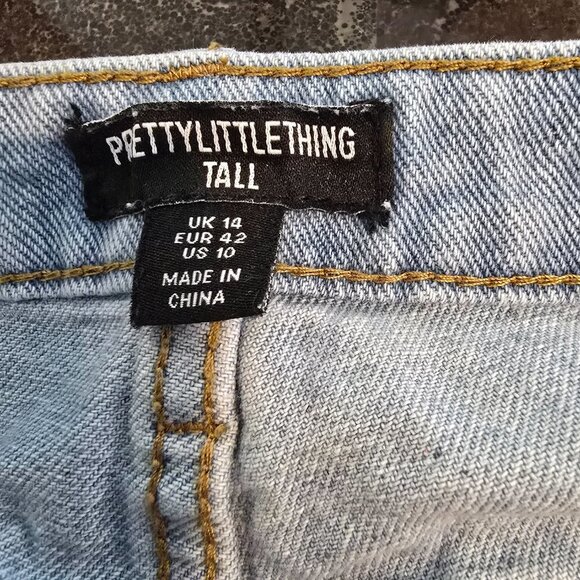 PrettyLittleThing Tall Light Blue Wash Distressed Denim Shorts - Picture 8 of 10